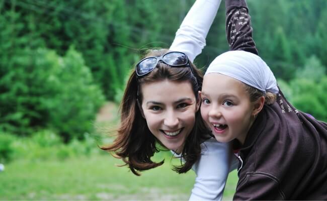 Mother and daughter playing together