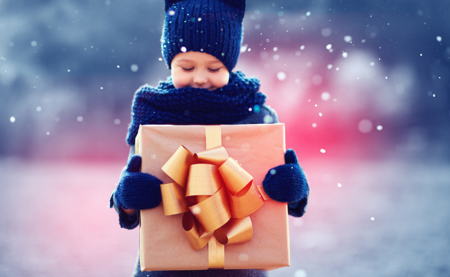 child holding a gift