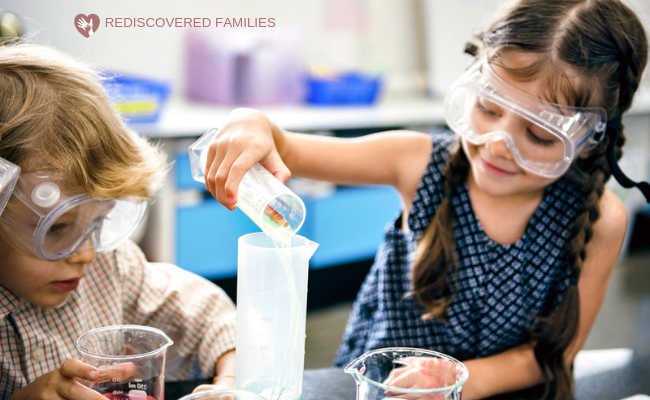 children wearing safety glasses and doing simple kids science experiments at home