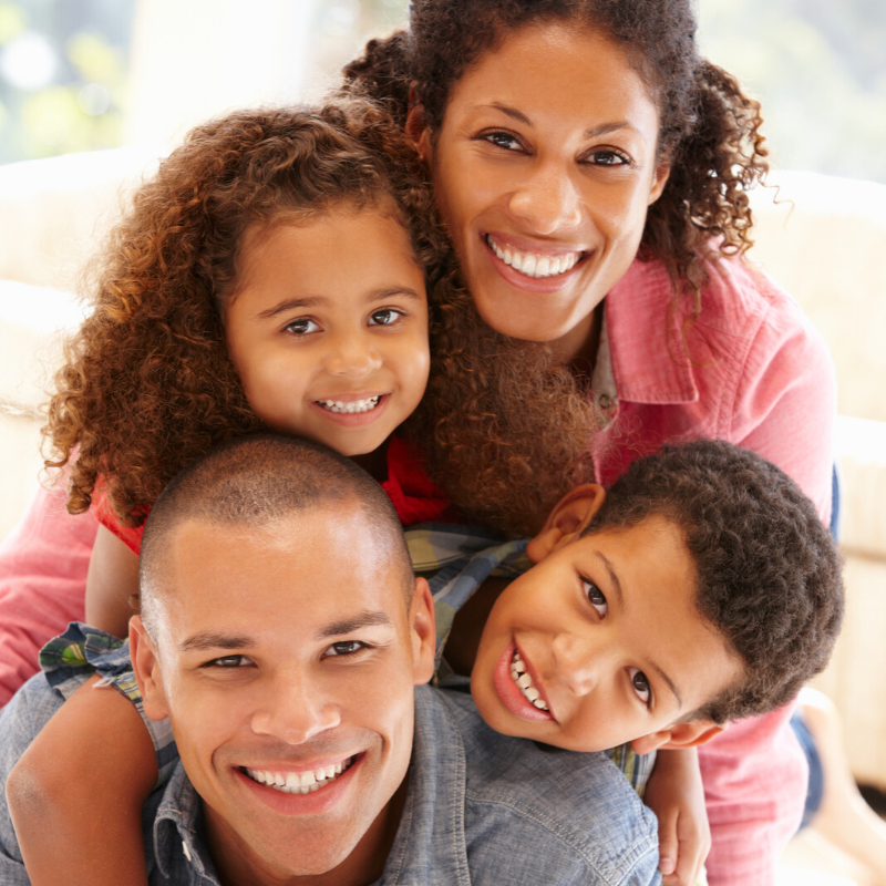 family piled on on top of the other