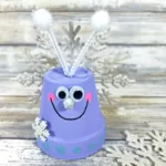 finished teracotta winter bug pot