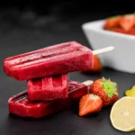 stack of strawberry lemonade popsicles