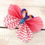 close up of a finished cupcake liner butterfly with embellishments