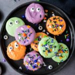 some Chocolate Covered Halloween Oreos displayed on aplate