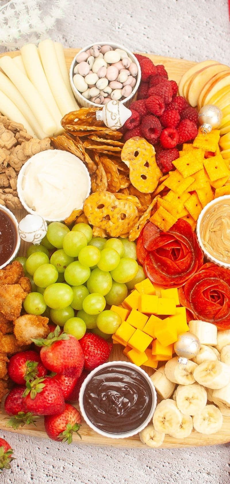 a picture pin for a post about creating a New Year's Eve Charcuterie board for kids