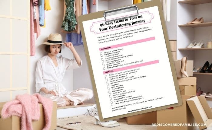 clipboard with the decluttering checklist in front of a women sitting in a closet with boxes piled all around