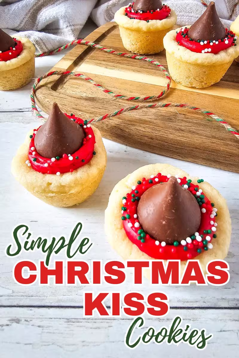 A Pinterest pin for a post with a recipe for CHristmas Kiss Cookies