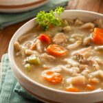 a bowl of chicken noodle soup