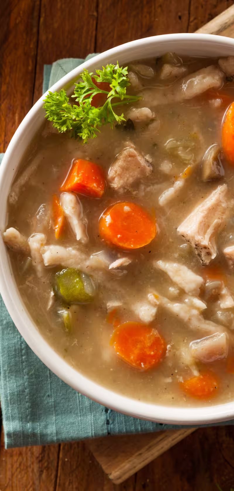 A pinterest pin. for a post with a recipe for chicken noodle soup
