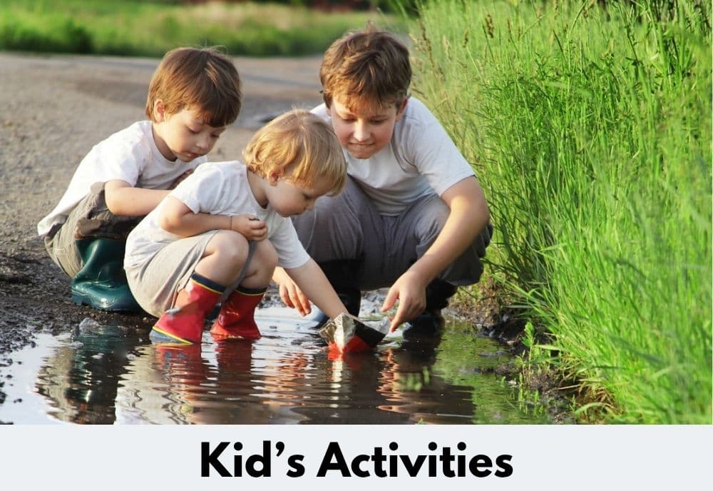 three children playing in puddles and text overlay reading, "Kid's Activities."