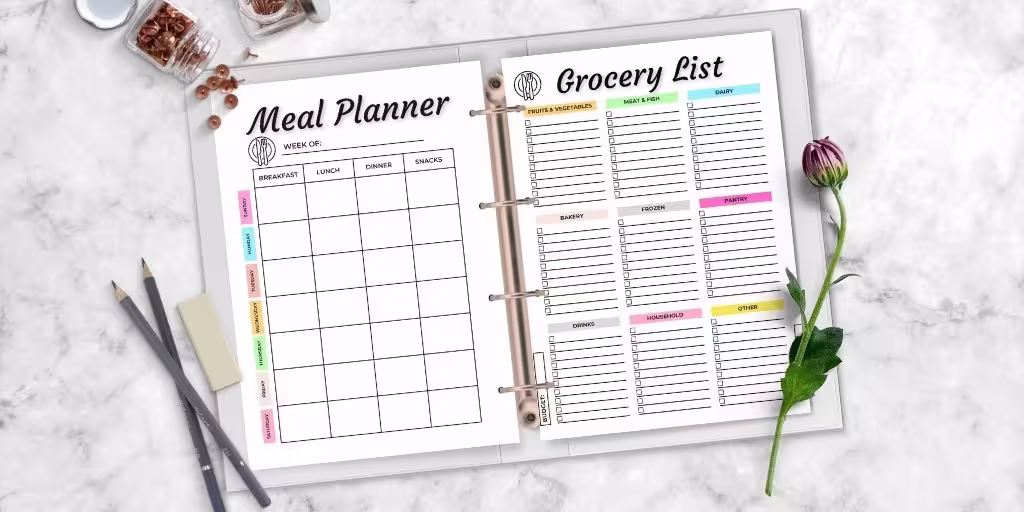 Free meal planner printable inserted into a binder