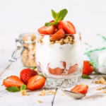A yogurt parfait made with homemade yogurt, granola and strawberries
