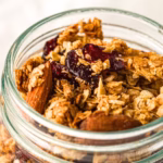 close up of homemade granola in a storage jar